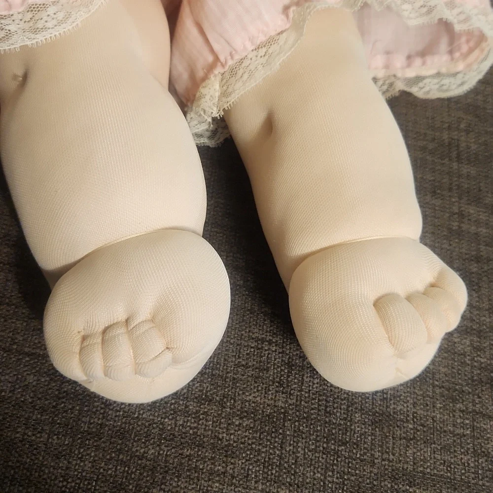 Charming Pink Doll with Curly Brown Hair